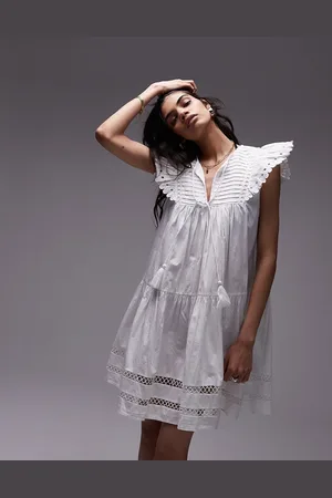 Topshop Tassel detail eyelet mini dress in