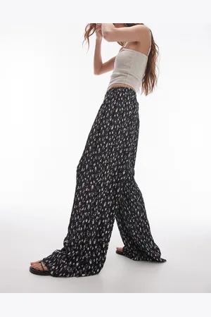 Topshop Delicate floral crinkle plisse wide leg pants in black and white