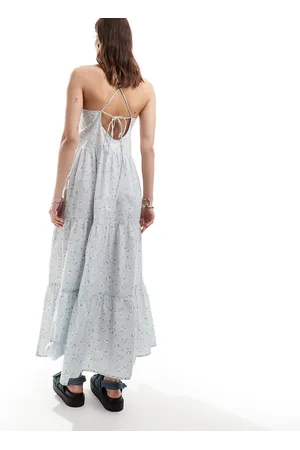 Monki Maxi sun dress with tiered layers and strappy low back in blue scattered ditsy flower print