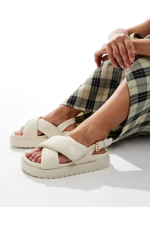 Truffle Collection Padded cross strap sandals in beige