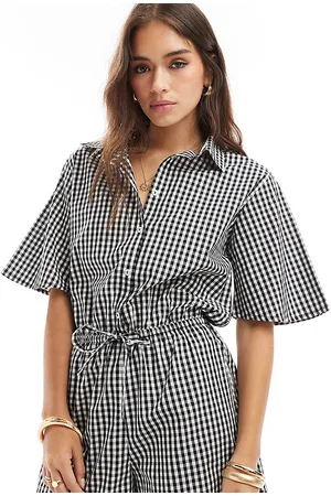 Esmée Beach romper in black and gingham