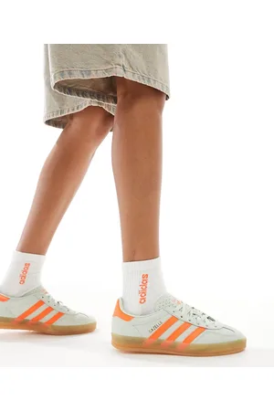 adidas Gazelle Indoor sneakers in light and orange