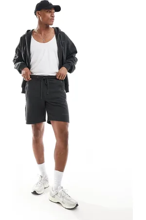 The Couture Club Raw seam jersey shorts in charcoal - part of a set