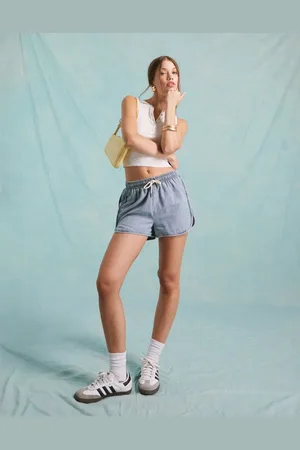 Miss Selfridge Denim runner shorts in light wash