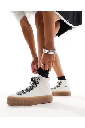 Converse Chuck Taylor All Star Hi Lift sneakers in with gum sole