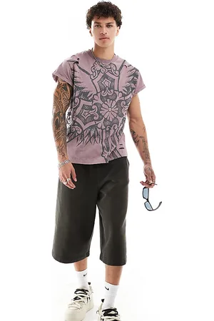 COLLUSION Oversized distressed cross print T-shirt in wash