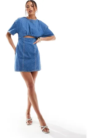 ASOS Denim mini dress with cut out knot detail in mid