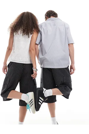 Reclaimed Unisex oversized shorts in black stripe