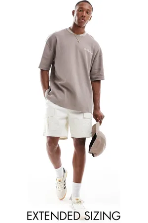 ASOS Oversized t-shirt in waffle with tipped neck and text chest print