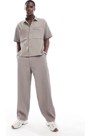 Bershka Wide leg plisse pants in light brown - part of a set