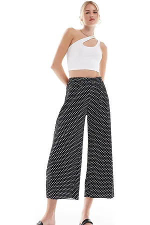 ASOS ASOS DESIGN Tall plisse wide leg culotte pants in polka dot