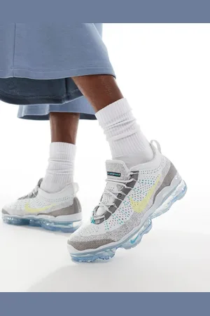 Nike Air VaporMax 2023 Flyknit sneakers in dark and orange
