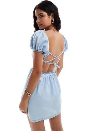 ASOS Puff sleeve denim mini dress with cross back detail in light