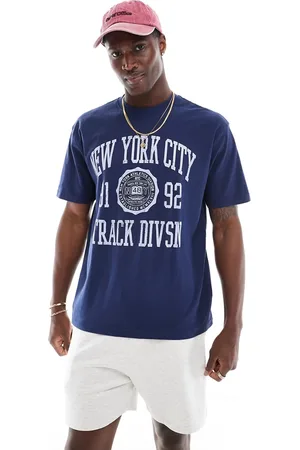 Cotton On Cotton On loose fit college T-shirt with NY track graphic in indigo