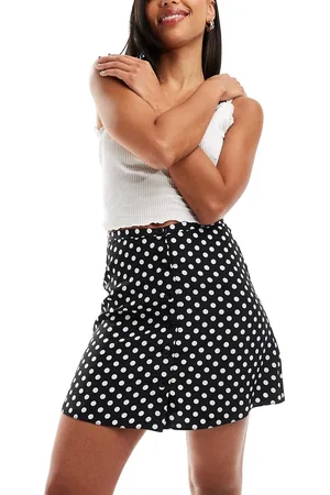 Miss Selfridge Button through flippy mini skirt in polka dot