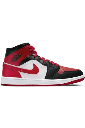 Jordan Nike Air 1 mid sneakers in and red