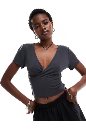 Monki Super soft cropped short sleeve top with wrap front detail in black
