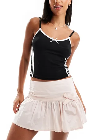 Motel Fita bow detail mini skirt in light