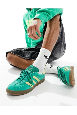 adidas Gazelle Indoor sneakers with gum soles in and yellow