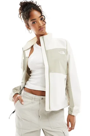 The North Face Easy Wind track jacket in cream and sage green