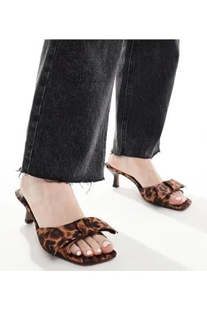 ASOS Wide Fit Hyphen bow detail mid heeled mules in leopard