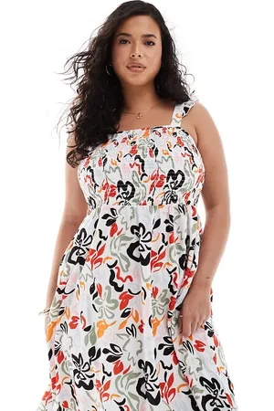 Pieces® Pieces Curve textured jersey frill strap maxi dress in beige animal print