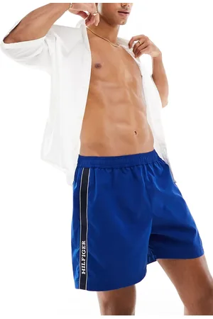 Tommy Hilfiger Monotype medium drawstring tape swim shorts in