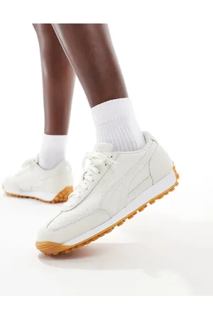 PUMA Easy Rider Weave sneakers in and white