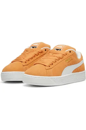PUMA Suede XL sneakers in mustard and white
