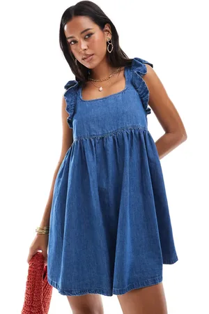 ASOS Soft denim smock mini dress with bow back in midwash