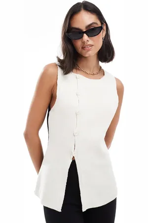 ASOS Knit asymmetric vest in color block in black and white