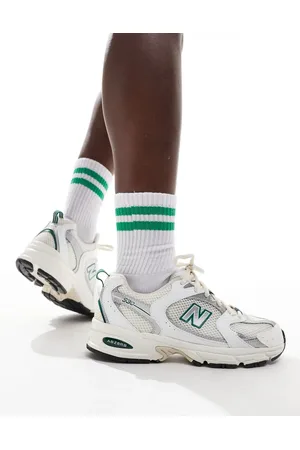 New Balance 530 sneakers in with green and gray details