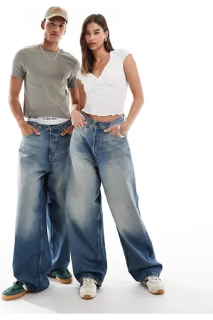 Weekday Unisex Astro loose fit wide leg jeans in streaky wash