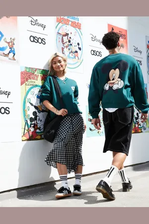 ASOS Disney unisex boxy fit v neck sweatshirt with Mickey Mouse prints in
