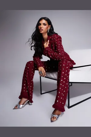 ASOS Embellished boucle kick flare pants with faux feather hem in Burgundy - part of a set