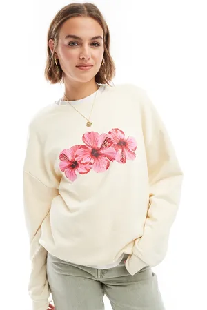 ASOS Oversized sweatshirt with hibiscus graphic in baby ecru