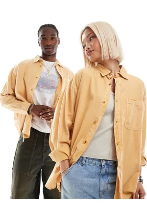 Reclaimed Unisex washed denim shirt in mustard