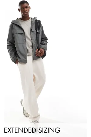 ASOS Rubberized rain jacket with chest pockets in charcoal