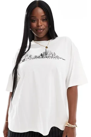 ASOS ASOS DESIGN Curve boyfriend fit t-shirt with phoenix cityscape graphic in cream