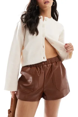 Miss Selfridge Faux leather pull on shorts in tan