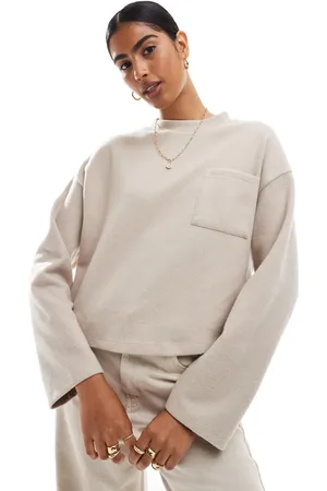 ASOS Supersoft oversized sweater with pocket detail in warm cream