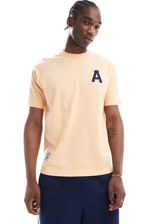 A Bathing Ape AAPE by A Bathing Ape backprint logo T-shirt in apricot
