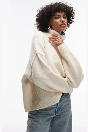 Topshop Knit exposed seam turtleneck relaxed sweater in ivory
