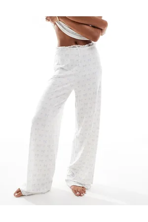 Kaiia Wide leg pajama bottoms in cream and blue bow print with lace trim - part of a set