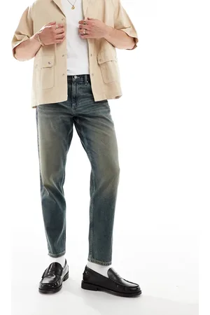 ASOS Tapered fit jeans in mid wash
