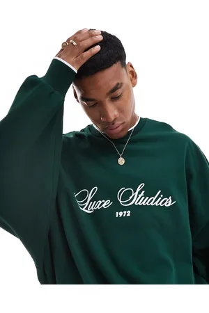 ASOS Extreme oversized crew neck sweatshirt with text print in dark