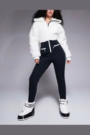 ASOS Hourglass Ski suit with faux fur panels and skinny leg in black and white