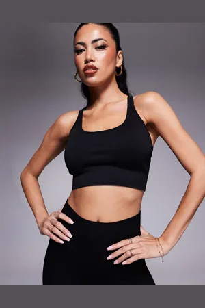 ASOS Seamless multi strap medium support sports bra with removable padding in