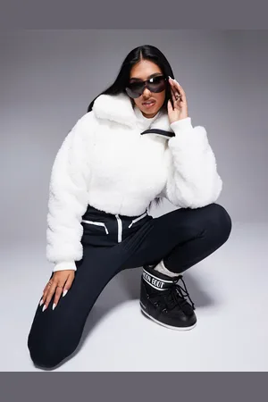 ASOS Ski suit with faux fur panels and skinny leg in black and white