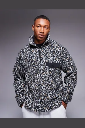 ASOS Oversized half zip sweatshirt in borg leopard print